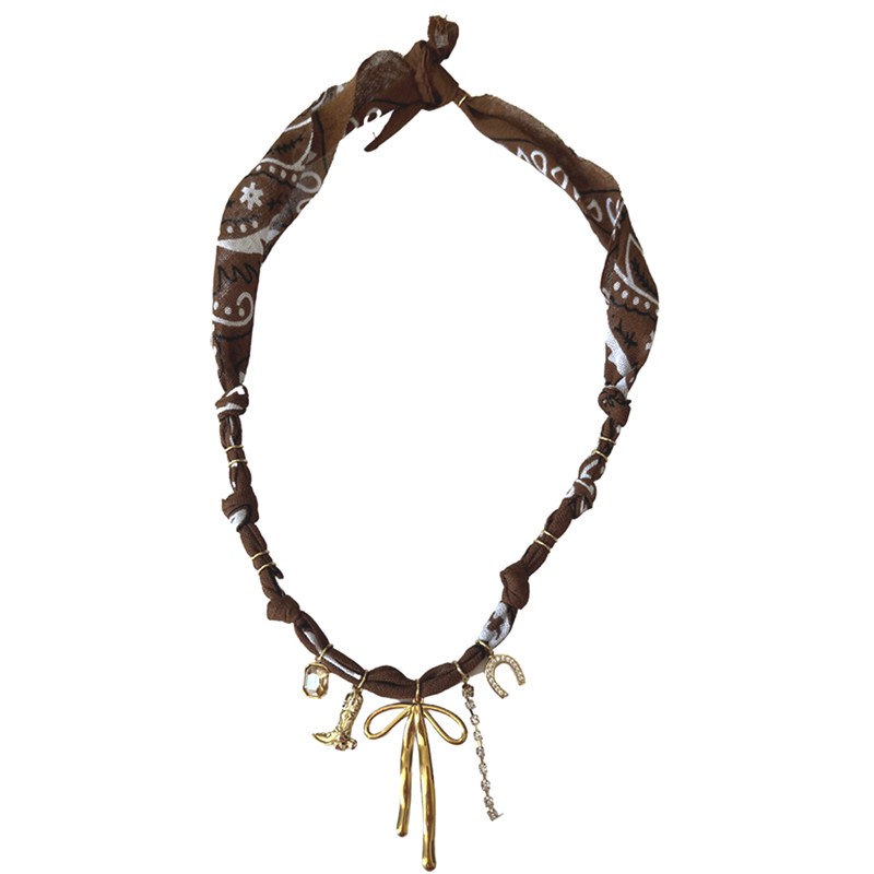 Collier bandana Noeud Cow-Boy Lover Choco - Charms dorés BADHNATI Collier bandana Noeud Cow-Boy Lover Choco - Charms dorés BADHNATI