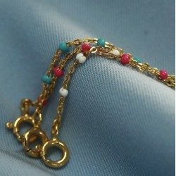 Collier court chaîne fine plaqué or & Perles de résine bleue