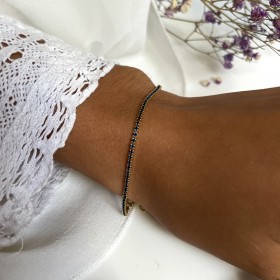 Bracelet fin pour femme ajustable en or et zircons bleus - élégant
